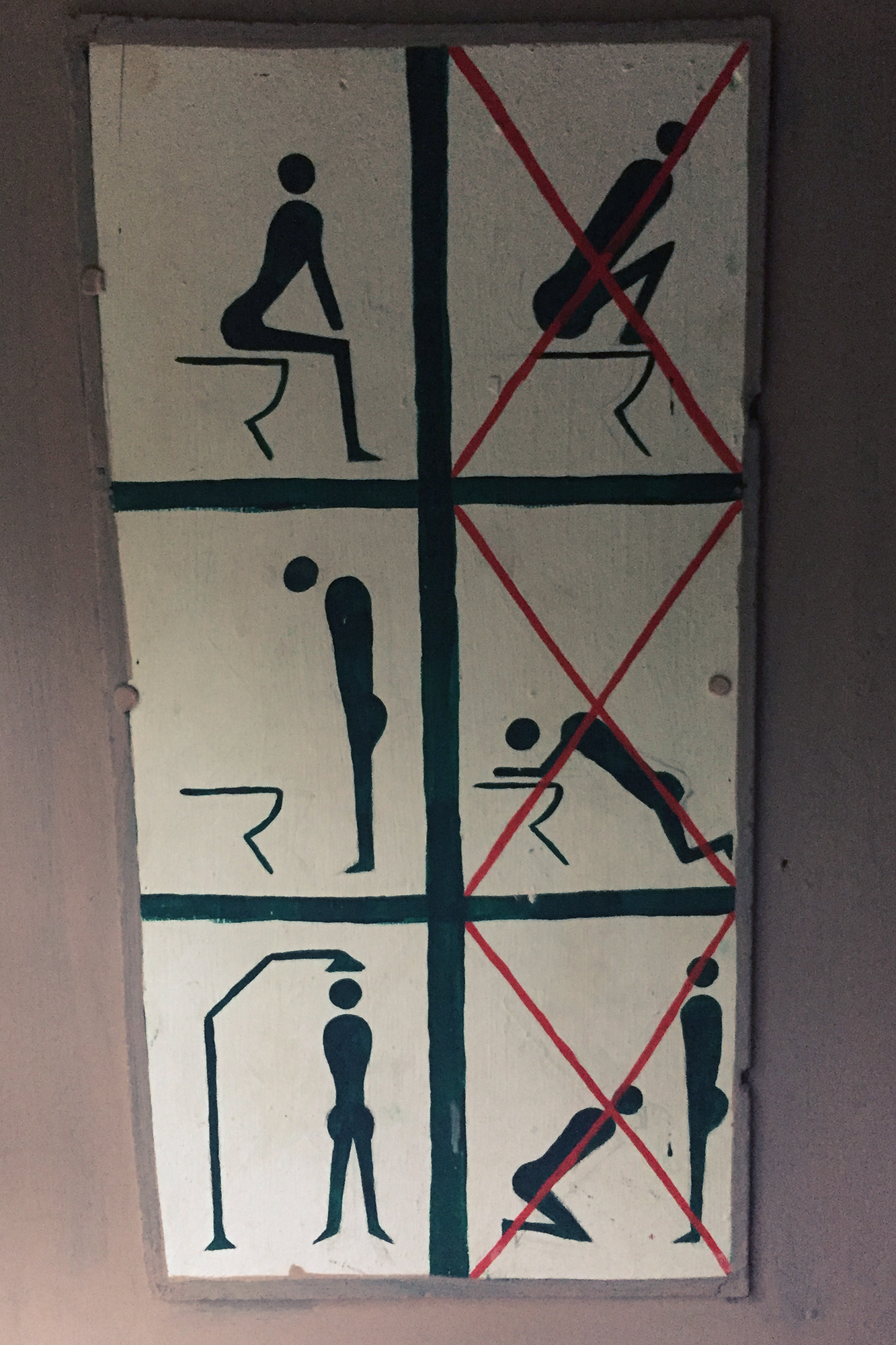 weird sign on toilet etiquette