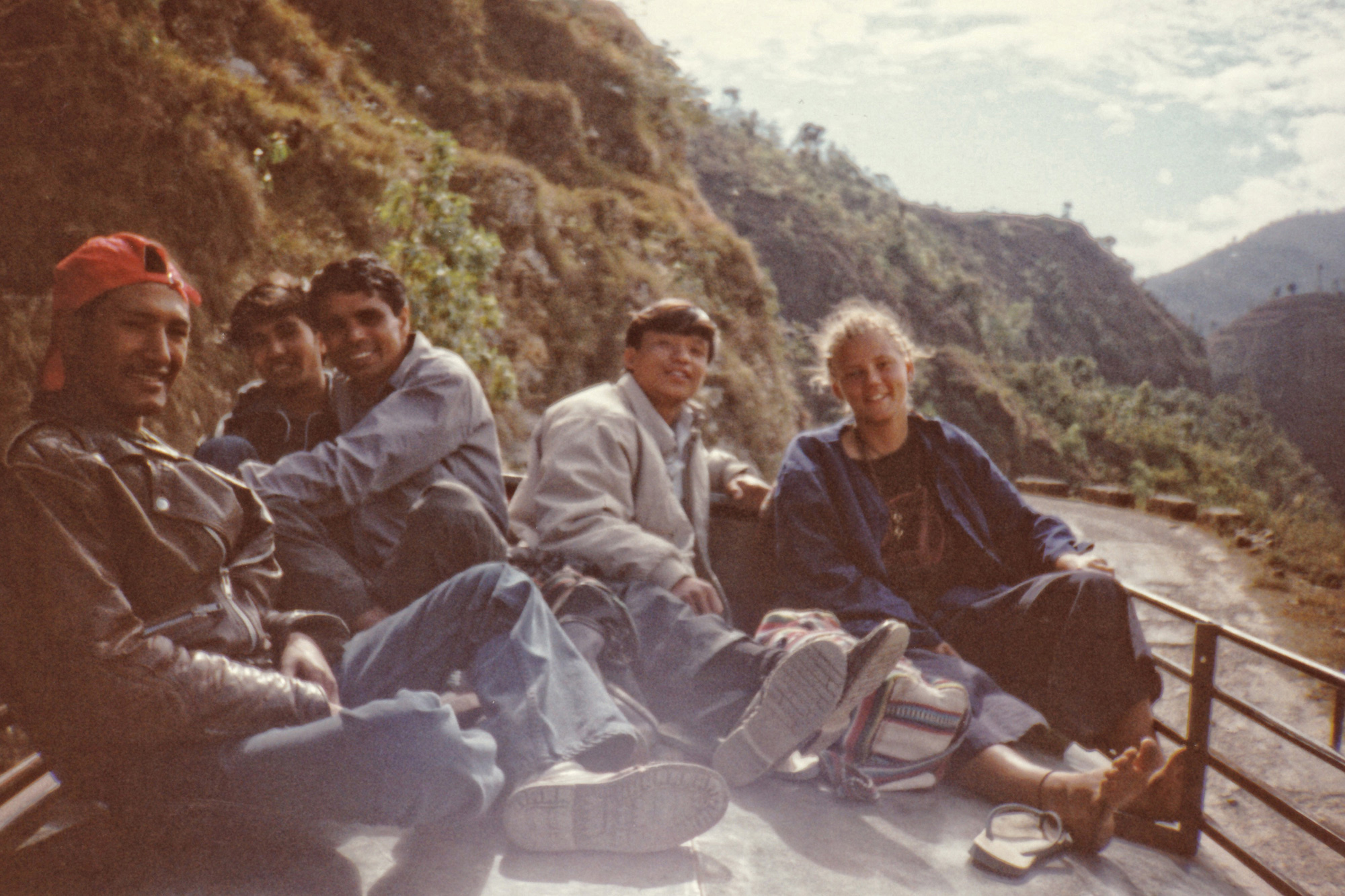 charnette woman on a bus roof in nepal