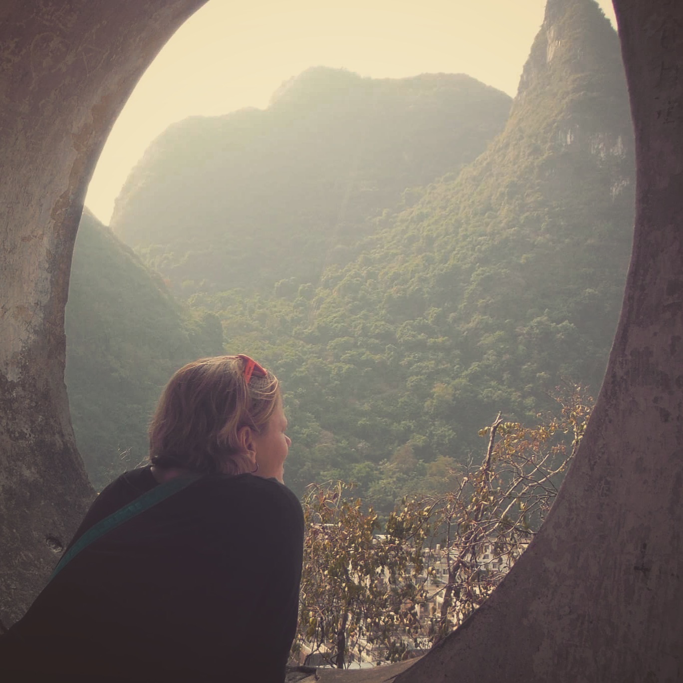 charnette woman looking out a window