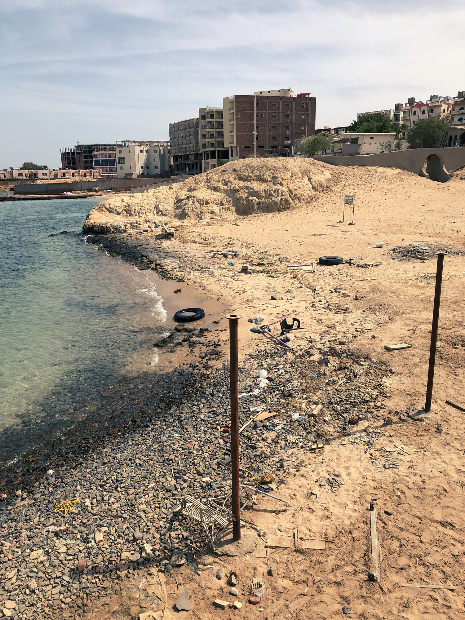 view over a dirty beach near by