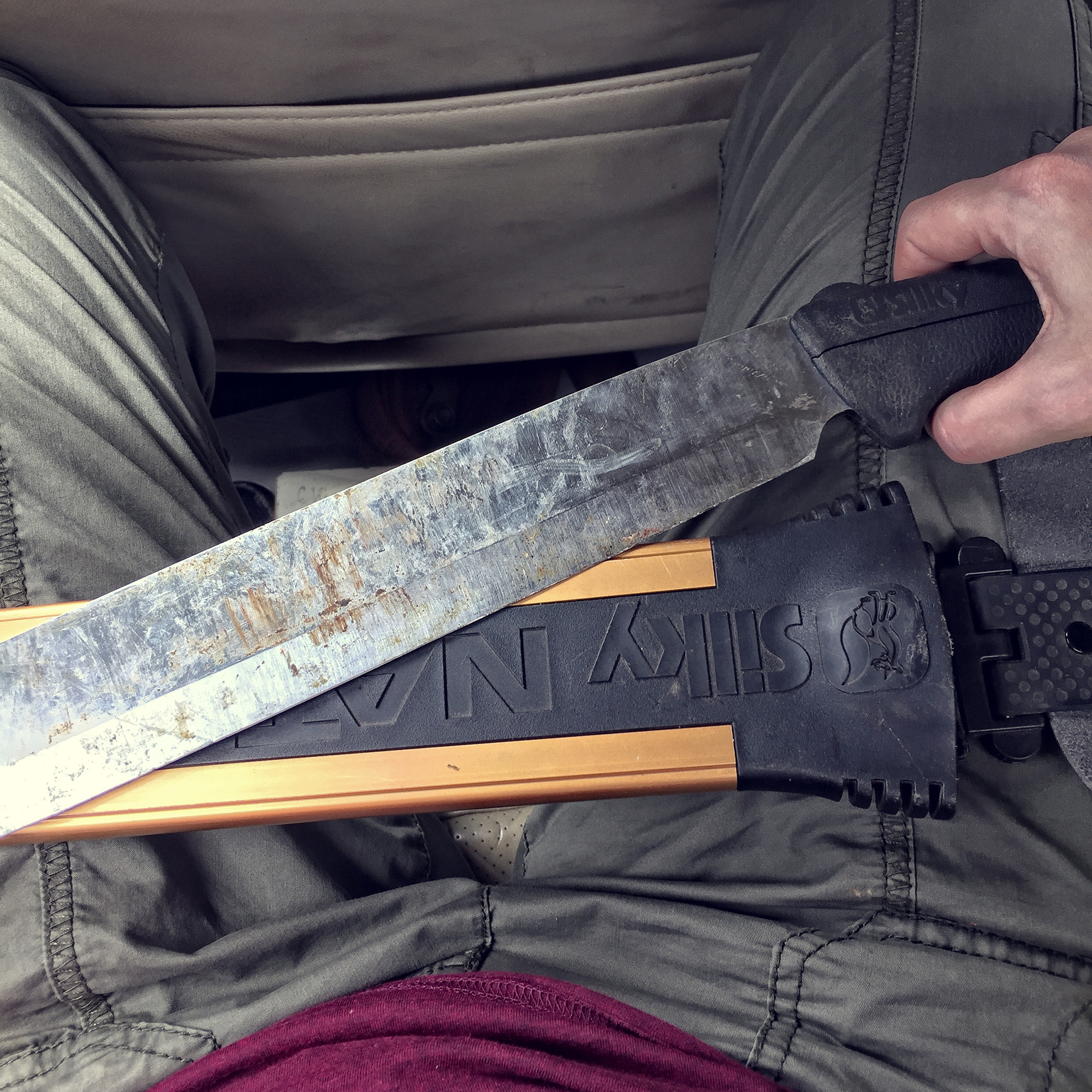 woman with machete in her hand