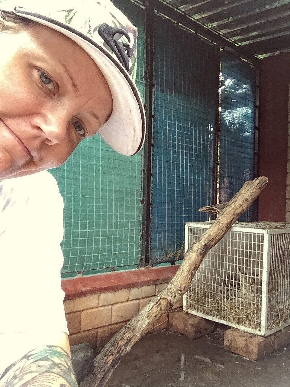 charnette woman in serval's cage volunteer in zimbabwe