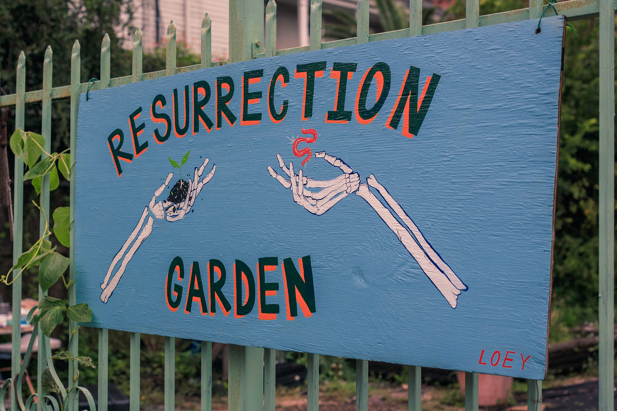 resurrection garden new orleans sign