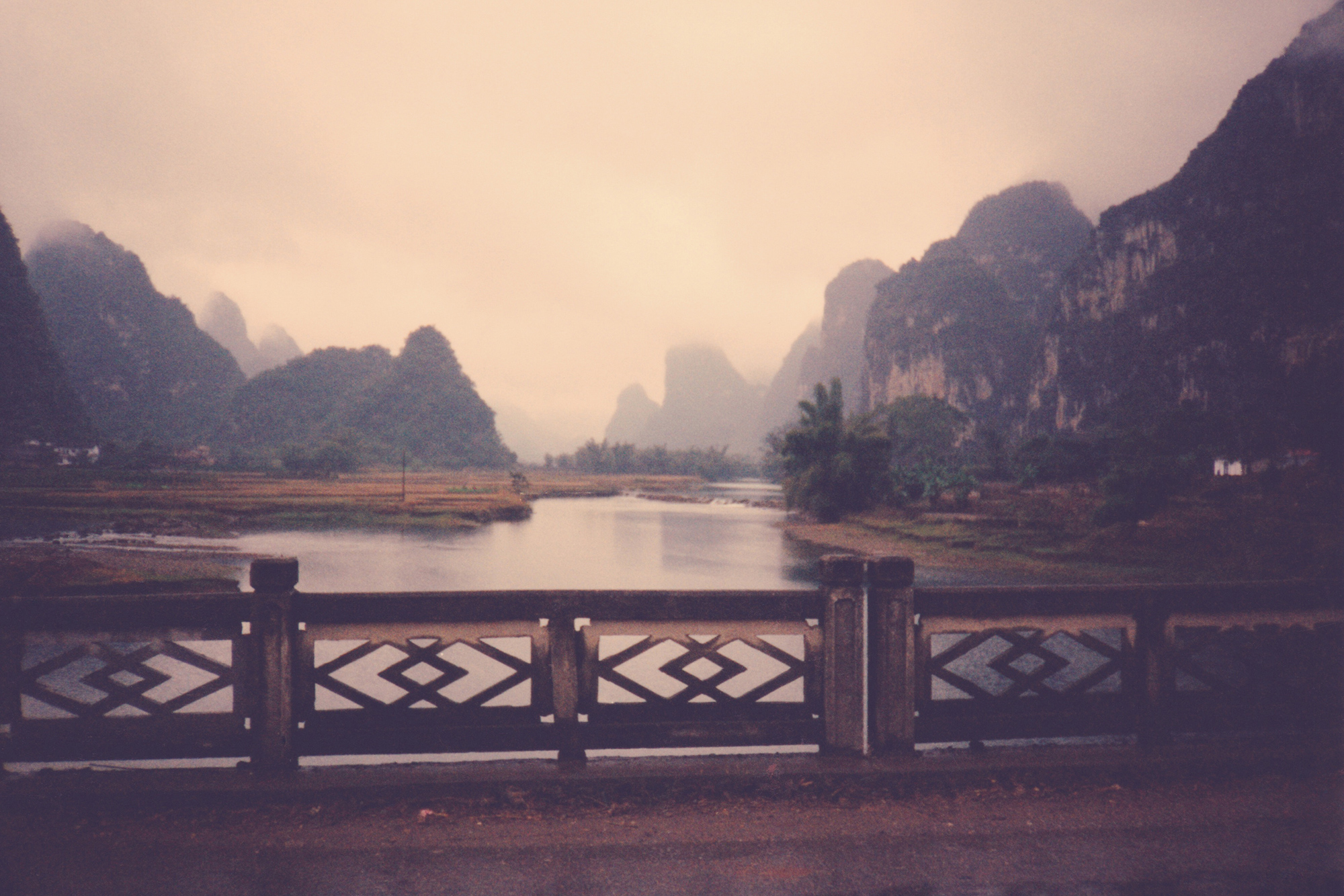 yangshuo china bridge misty