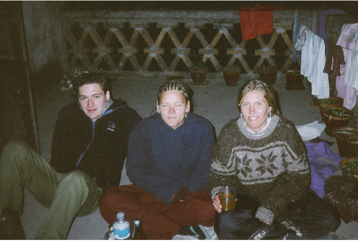three people sitting on the roof terrace kathmandu travel memories