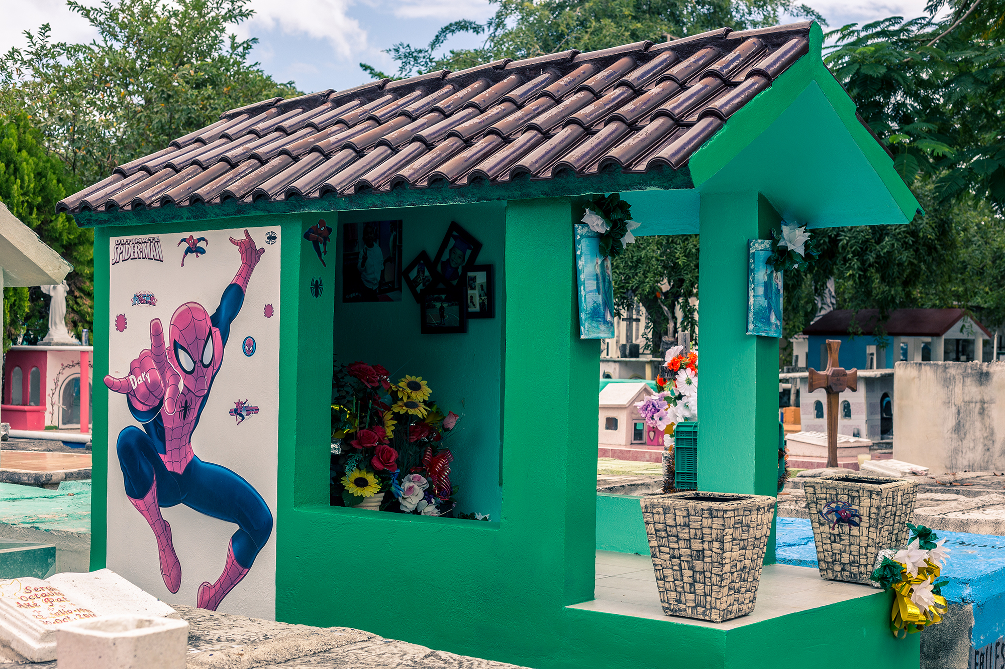 child's grave in playa del carmen spiderman cemeteries in mexico