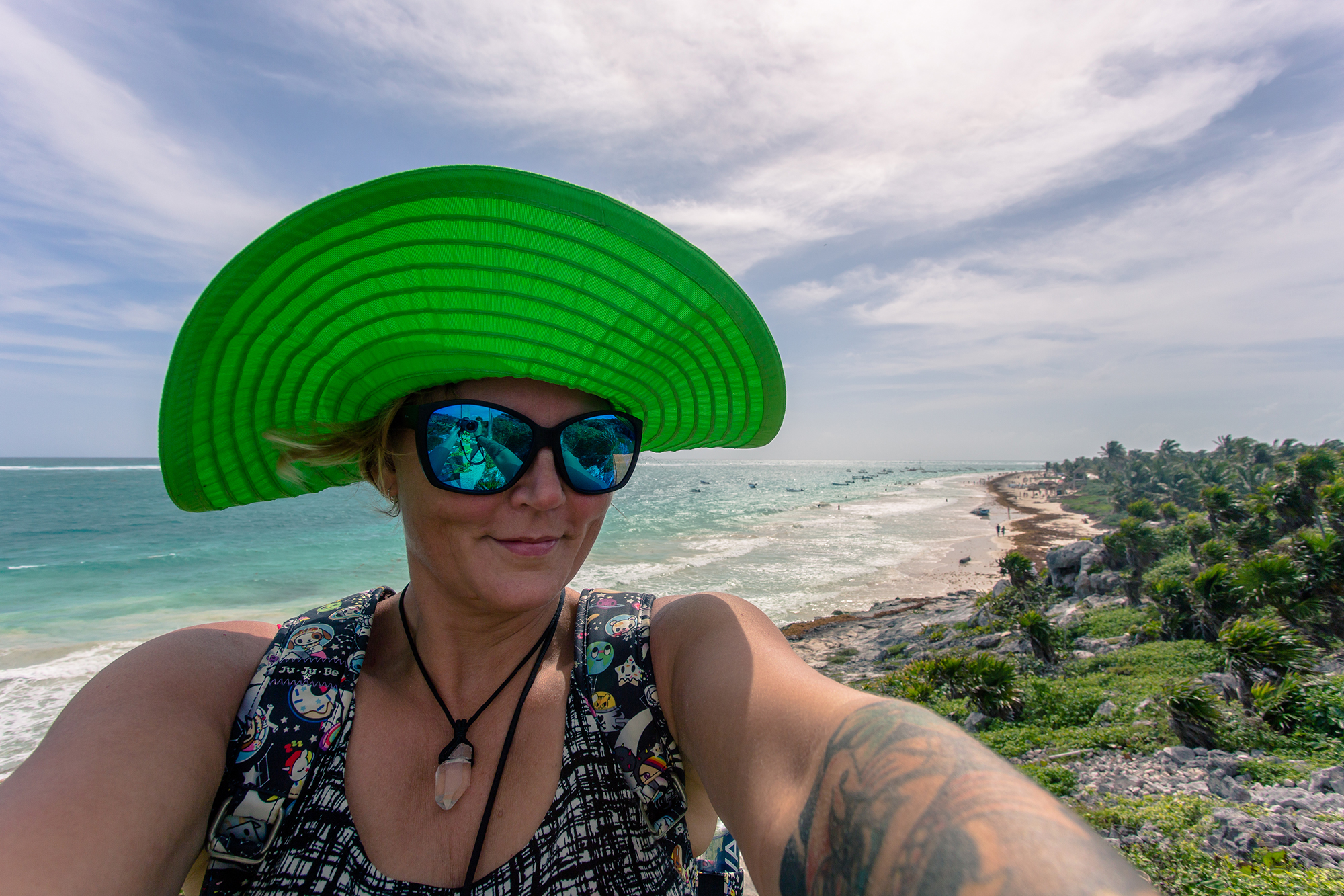 charnette woman taking selfie at playa paraiso tulum