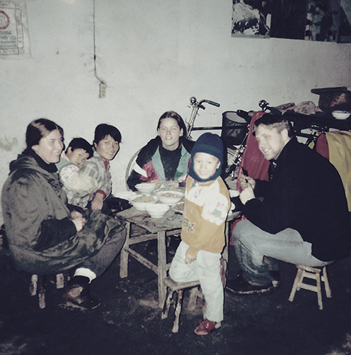 people sitting around a table in china